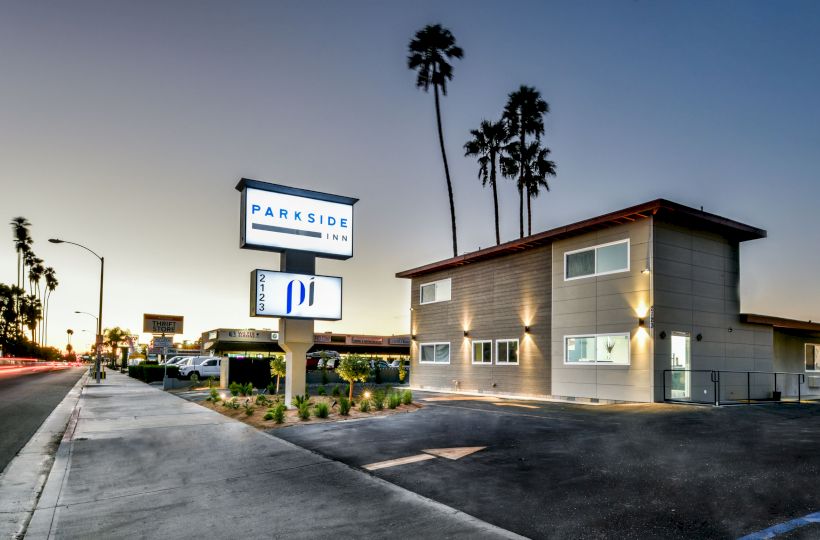 Image of a modern building at sunset with a 