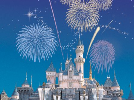 A castle with turrets is illuminated by colorful fireworks in the night sky, showcasing a magical, festive atmosphere of celebration and joy.